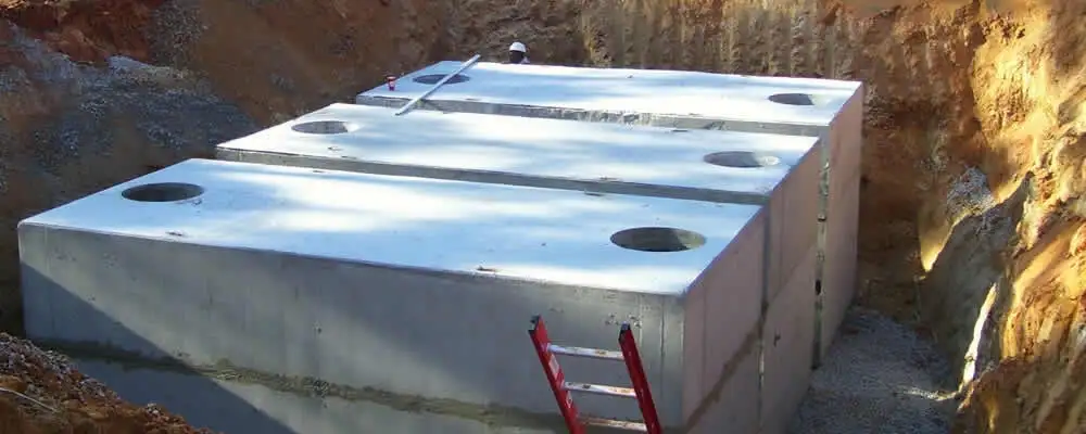 Septic tank installation site with a newly placed concrete tank in Baltimore, MD